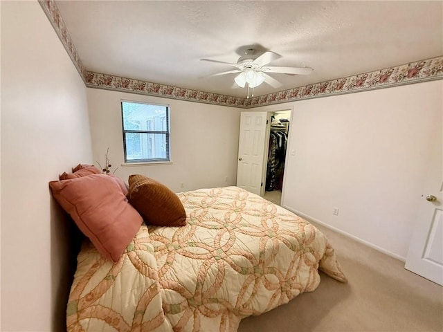 28 Sammy Snead Dr, Hilltop Lakes, TX 77871 - bedroom with light carpet, ceiling fan, and baseboards