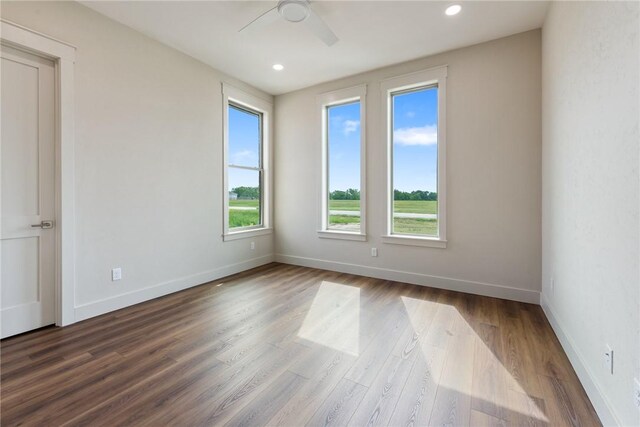 10732 Harvey Ranch Rd, College Station, TX 77845 - empty room featuring baseboards, a ceiling fan, wood finished floors, and recessed lighting
