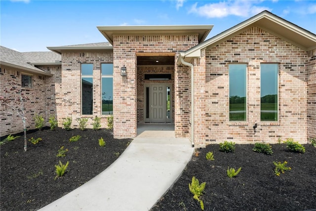 10732 Harvey Ranch Rd, College Station, TX 77845 - property entrance featuring brick siding