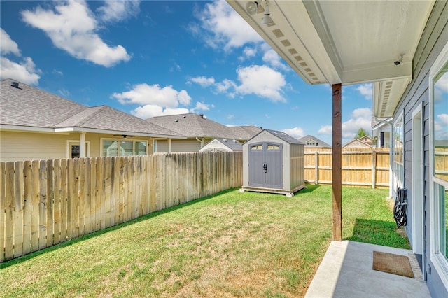 2124 Mountain Wind Loop, Bryan, TX 77807 - fenced backyard with a storage shed, a patio, and a ceiling fan