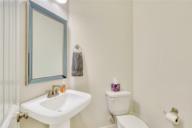 2124 Mountain Wind Loop, Bryan, TX 77807 - bathroom featuring a sink and toilet