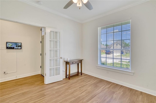 2124 Mountain Wind Loop, Bryan, TX 77807 - empty room with light wood finished floors, a ceiling fan, crown molding, and a smoke detector