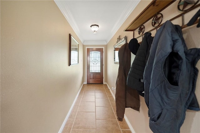 mudroom with crown molding and light tile patterned floors