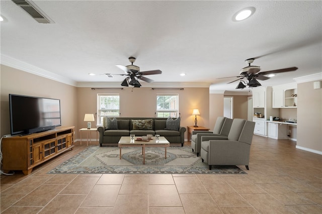 tiled living room with crown molding