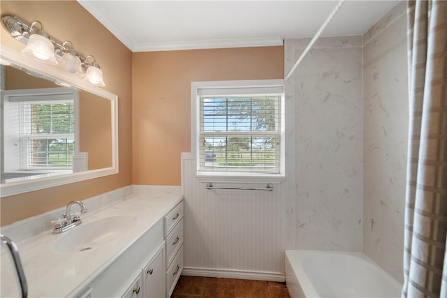 bathroom with vanity, a healthy amount of sunlight, crown molding, and shower / bathtub combination