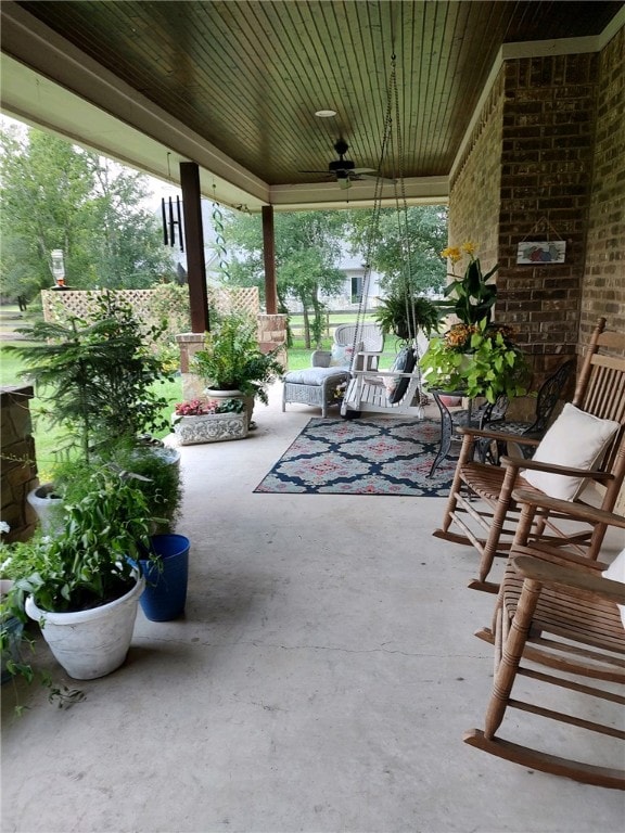 view of patio with a ceiling fan