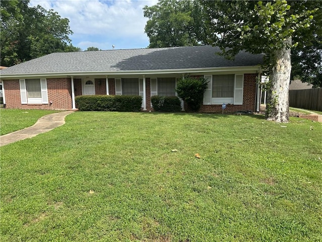 604 W Buck St, Caldwell, TX 77836 - single story home with brick siding and a shingled roof