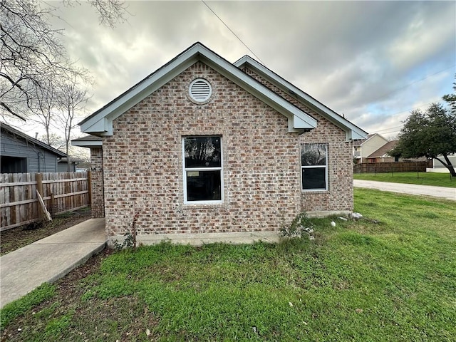 1508 Lopez St, Bryan, TX 77803 - view of side of home with brick siding