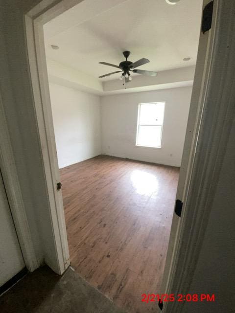 1508 Lopez St, Bryan, TX 77803 - spare room featuring wood finished floors and a ceiling fan
