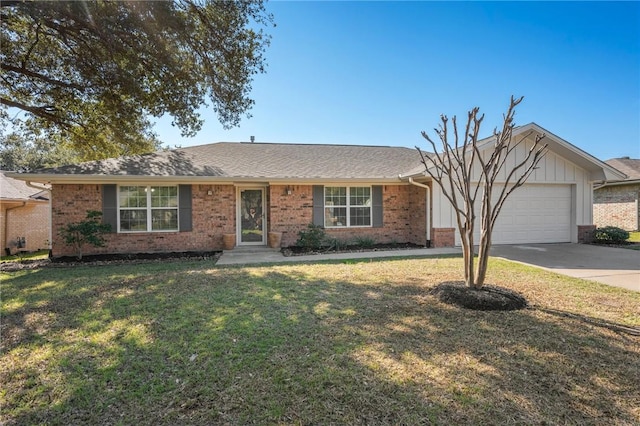 ranch-style home featuring a garage and a front lawn