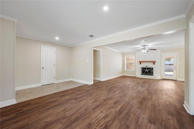 unfurnished living room featuring ceiling fan, dark hardwood / wood-style floors, and ornamental molding