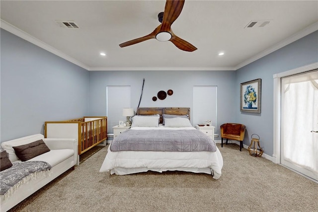 bedroom featuring carpet floors, ornamental molding, multiple windows, and ceiling fan