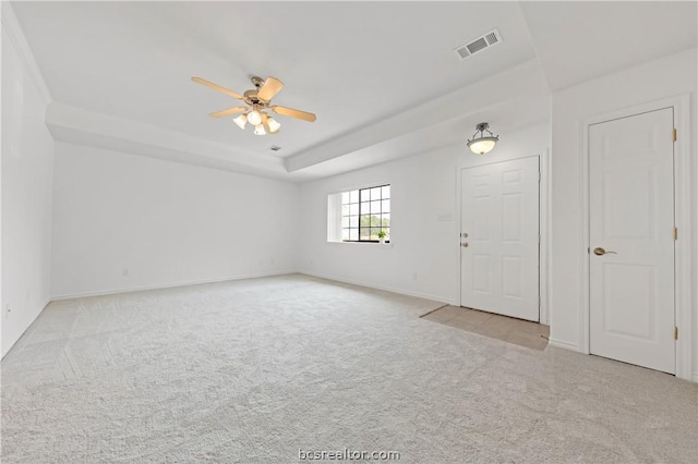 carpeted empty room with ceiling fan