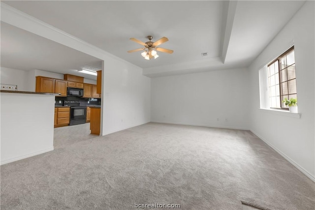 unfurnished living room with light colored carpet and ceiling fan