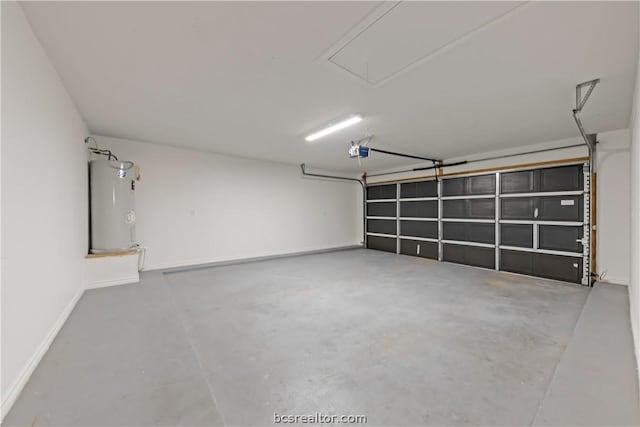 garage featuring a garage door opener and water heater