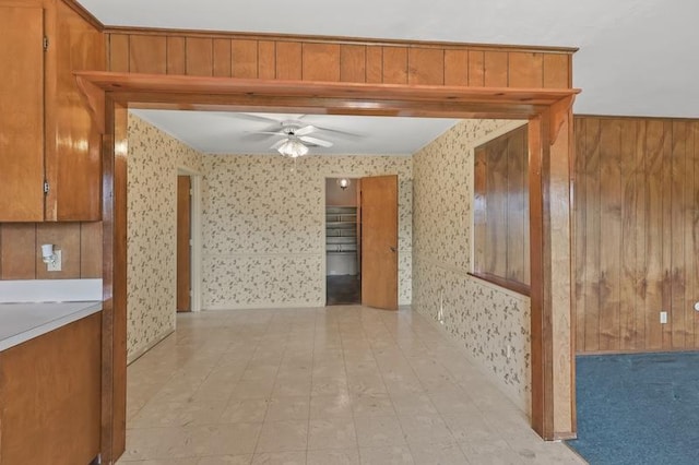 hallway with wallpapered walls