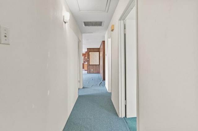 corridor featuring carpet and visible vents