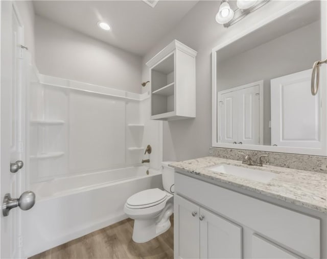 515 Hayes Ln, College Station, TX 77845 - bathroom featuring vanity, wood finished floors, and shower / tub combination