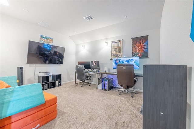 975 Harper Ln, Bryan, TX 77803 - carpeted office space featuring vaulted ceiling, visible vents, and baseboards