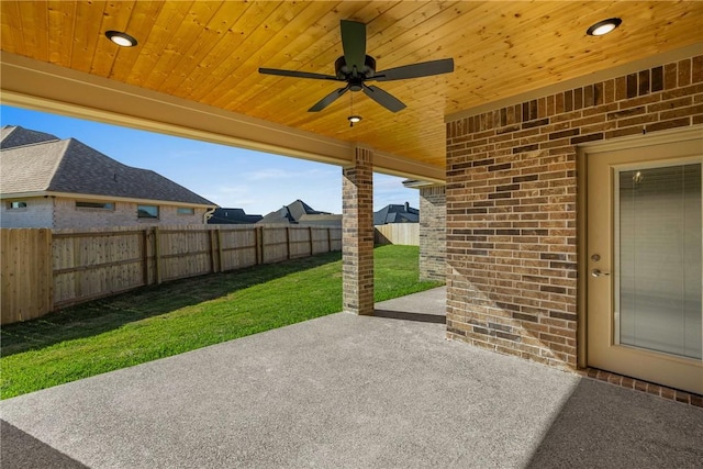 2917 Bombay Ct, Bryan, TX 77808 - fenced backyard featuring a patio and ceiling fan