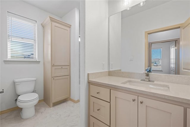 2917 Bombay Ct, Bryan, TX 77808 - bathroom featuring vanity, plenty of natural light, and marble finish floors