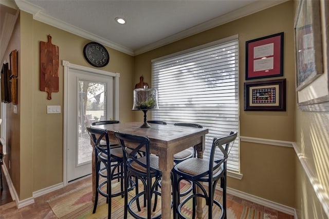 dining room with ornamental molding