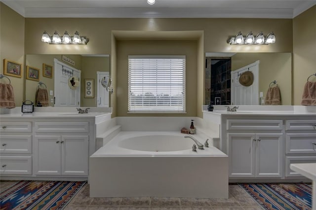 bathroom featuring vanity and a tub