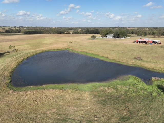 bird's eye view with a rural view and a water view