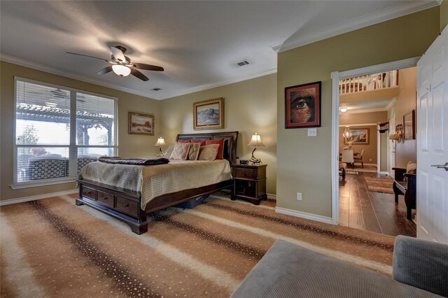 bedroom with ceiling fan, crown molding, and wood-type flooring