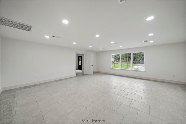 empty room featuring light tile patterned flooring