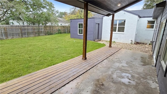 view of patio / terrace featuring an outbuilding and fence private yard