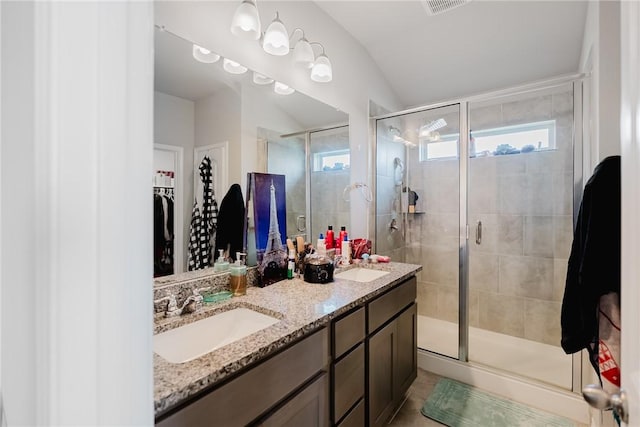 2140 Chief St, Bryan, TX 77807 - full bath featuring double vanity, a stall shower, and a walk in closet