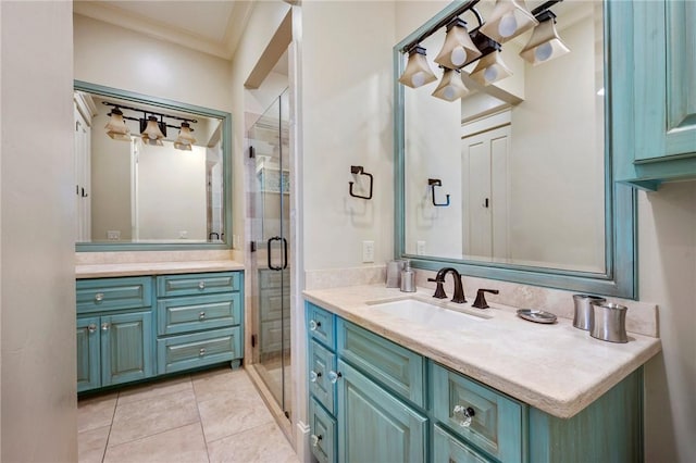 bathroom featuring tile patterned flooring, a shower stall, vanity, and crown molding