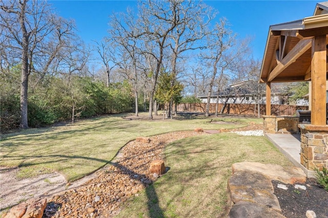 view of yard with fence