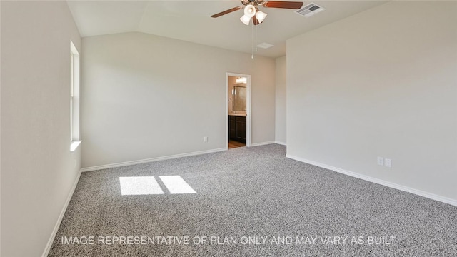 carpeted empty room with ceiling fan and lofted ceiling