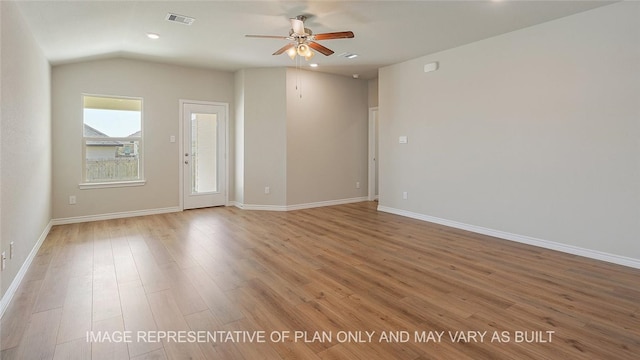 unfurnished room with vaulted ceiling, ceiling fan, and light hardwood / wood-style floors