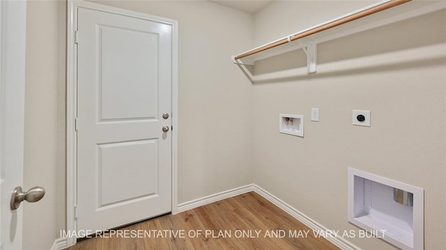 clothes washing area with washer hookup, wood-type flooring, and hookup for an electric dryer