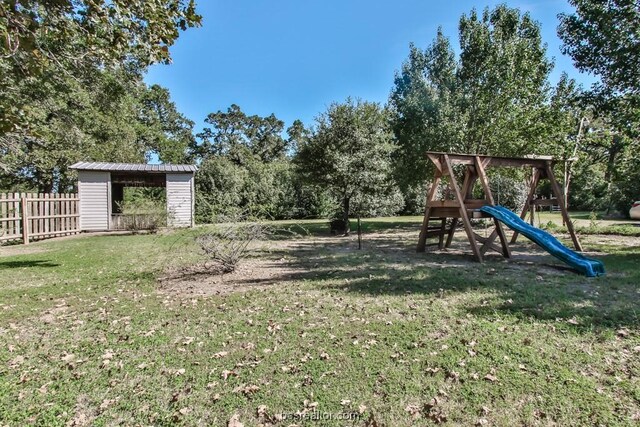 view of yard with a playground