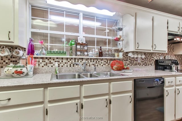 kitchen with black dishwasher, tasteful backsplash, white cabinetry, and sink