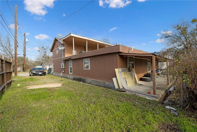 view of home's exterior with a lawn