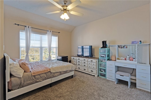 bedroom with ceiling fan, carpet, and lofted ceiling