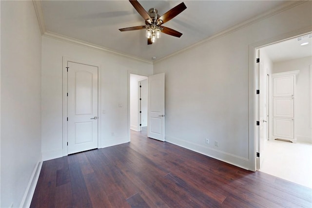 unfurnished bedroom with dark hardwood / wood-style floors, ceiling fan, and ornamental molding