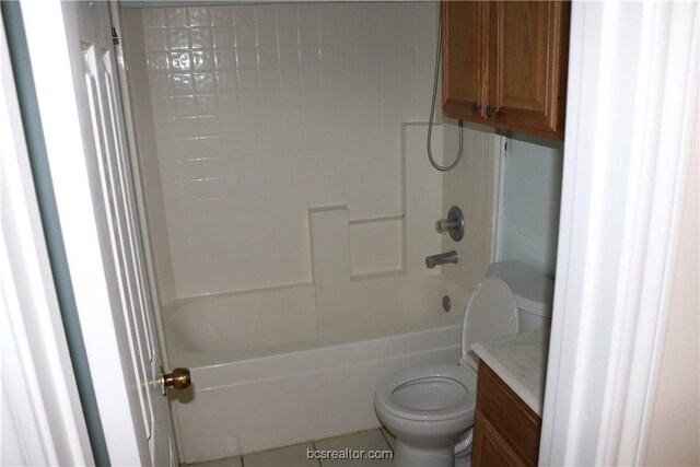 full bathroom featuring tile patterned flooring, vanity, toilet, and shower / washtub combination