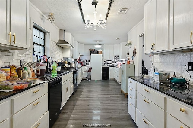 kitchen featuring decorative backsplash, dark hardwood / wood-style flooring, wall chimney range hood, white cabinets, and white fridge