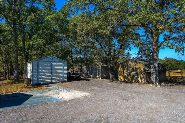 exterior space featuring a storage unit