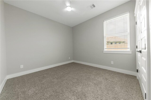 2916 Bombay Ct, Bryan, TX 77808 - empty room with carpet flooring and baseboards