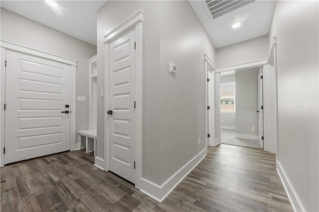 2916 Bombay Ct, Bryan, TX 77808 - hallway with dark wood-style flooring and baseboards