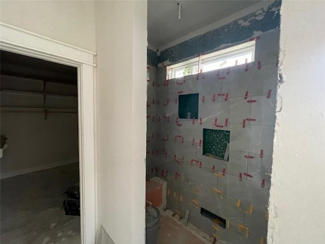 bathroom with concrete floors