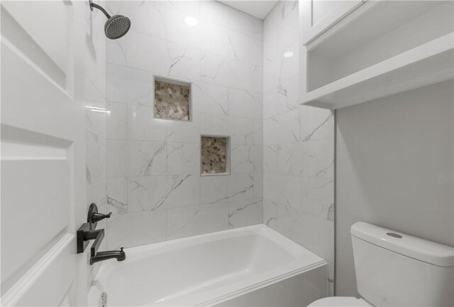 2916 Bombay Ct, Bryan, TX 77808 - bathroom featuring shower / bath combination and toilet
