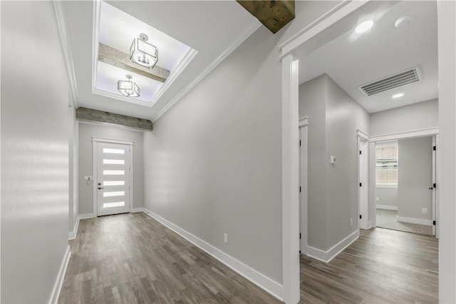 2916 Bombay Ct, Bryan, TX 77808 - entrance foyer with healthy amount of natural light, wood finished floors, and baseboards